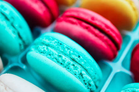 Assorted macaroons sweets, close up, backdrop. Marine, pink and violet.の写真素材