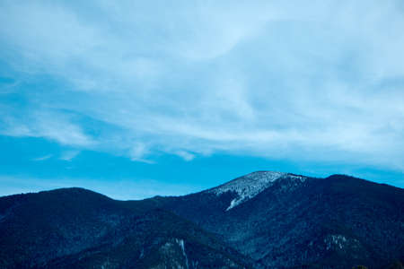 Photo depicting a beautiful moody frosty landscape European alpine mountainsの写真素材