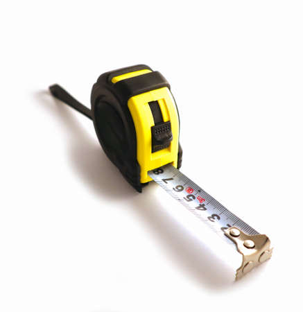 Professional yellow measure tape, engineering tool.