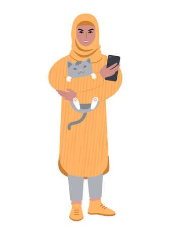 Young woman wearing headscarf holding up a cute cat and a smartphone. Pets and mobile devices. Flat style vector illustration.のイラスト素材