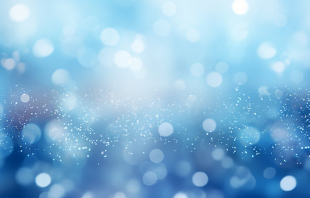 Abstract blue bokeh light background. Beautiful Christmas and New Year backdrop.の素材