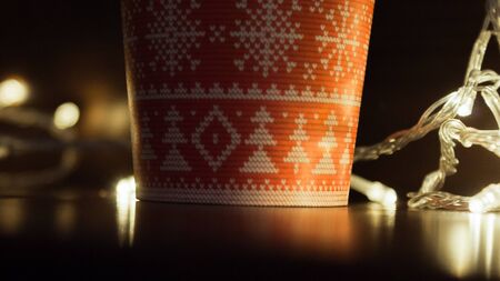 Glowing Lights And Christmas Cupの写真素材