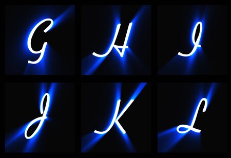 letters of the alphabet on a black backgroundの写真素材