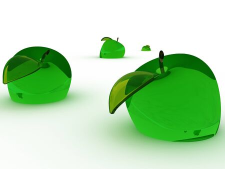 green glass apples on a white backgroundの写真素材