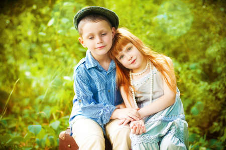 Little boy and girl on natureの写真素材