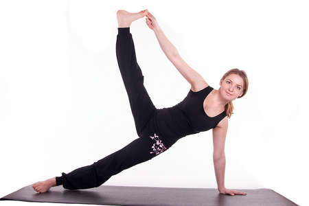 Female athlete posing on a white background