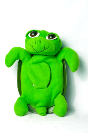 Green turtle toy on a white background