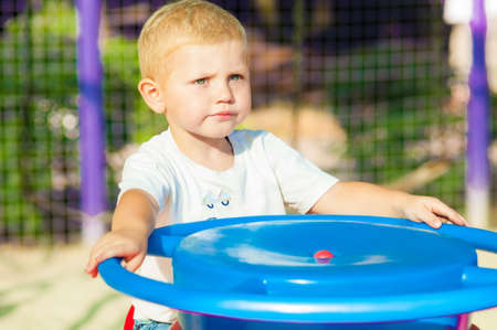 Child walking in the park in summerの写真素材