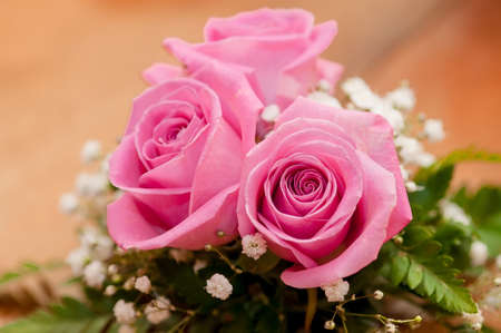 Wedding bouquet of beautiful roses and ringsの写真素材