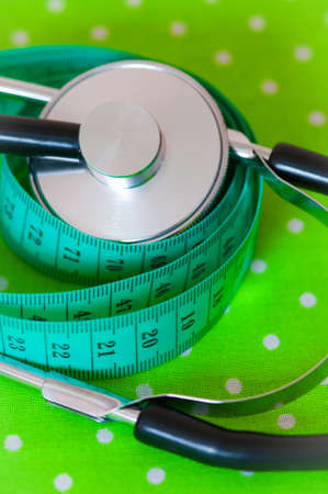 The measuring tape and stethoscopeの写真素材