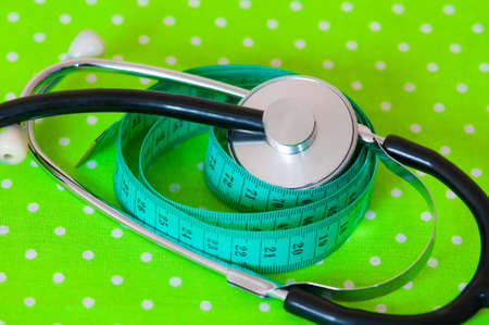 The measuring tape and stethoscopeの写真素材