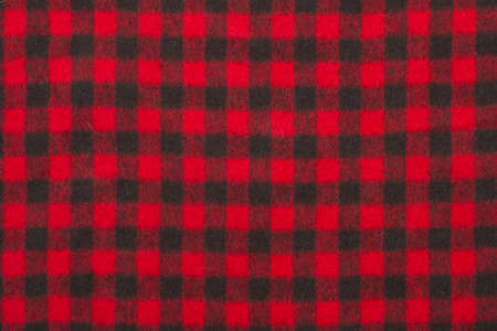 Red wool fabric texture with cellの写真素材