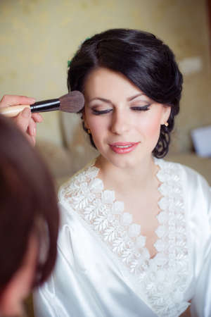 bride makeup is applied in the morningの写真素材