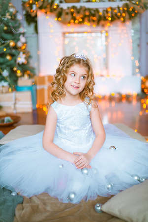 Little girl with curly hairの写真素材