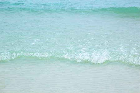 small wave on beachの写真素材