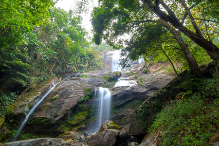 Waterfall in the tropical rain forest of Thailand の写真素材