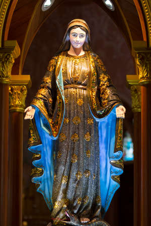 The golden and jewellry decoration of Mary sculpture のeditorial素材