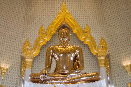 The real gold Buddha sculpture in the temple of Thailand のeditorial素材