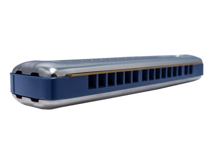 Harmonica on the white background