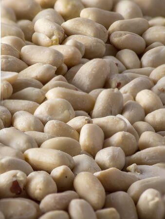 Raw peanuts for the background