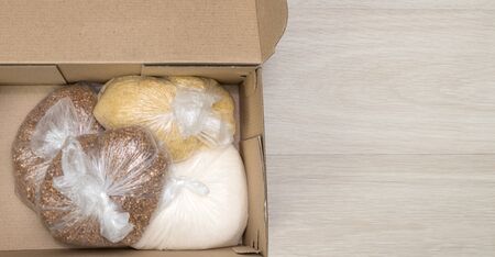 opened box with long term food supplies