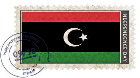 libya flag on stamp independence day with date pumpの写真素材