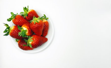 Sweet juicy strawberries on a white background, in the container, back, strawberries on a saucer, strawberries in rosspの写真素材