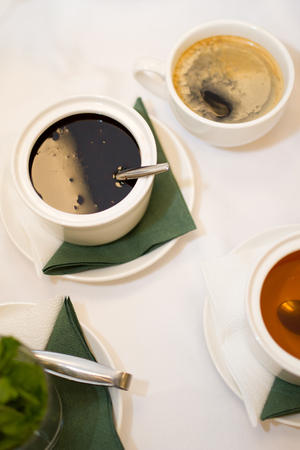 Photo of black sauce on a white tableの写真素材