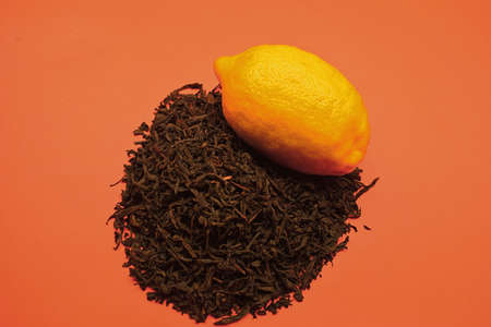A slide of dry black tea and lemon.