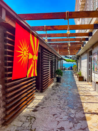 Ohrid, Macedonia, June, 11, 2021, Flag of Northern Macedonia on the old street of Ohrid, vertical phototのeditorial素材