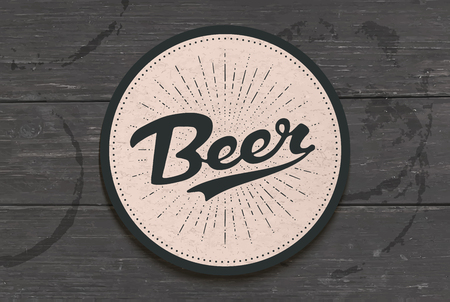 Coaster for beer with hand drawn lettering Beer. Monochrome vintage drawing for bar, pub and beer themes. Black coaster for placing a beer mug or a bottle over it with lettering. Vector Illustrationのイラスト素材