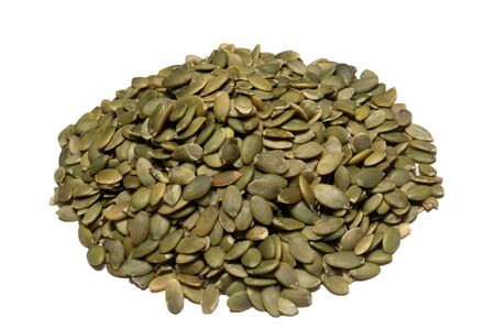 Lot of whole tasty green pumpkin seeds isolated on white background