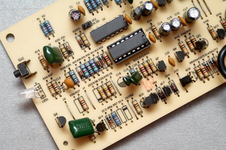 PCB. Board with components from electrical device. Tichnical and electronics concept