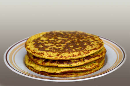 Stack of delicious pancakes on plate