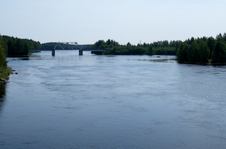 View of the steel railway bridge over a small river