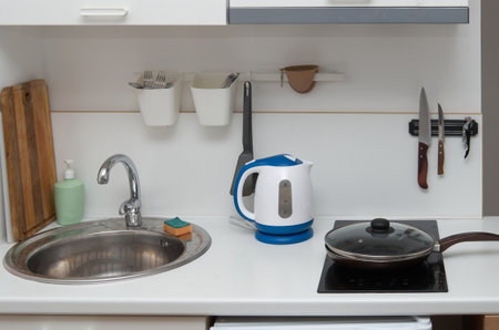 The interior of a small kitchen in bright colorsの写真素材