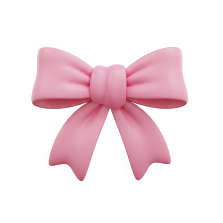 A single, soft pink ribbon bow with elegant loops and trailing ends, presented clearly on a plain white background.の素材