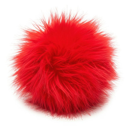 A single, vibrant red pom pom with a fluffy texture sits alone on a clean white background.の素材