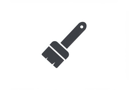 A vector illustration of a paint brush icon. The brush has a handle with a hole and bristles. It is isolated on a white background and is a simple, clean design suitable for various creative applications.の素材