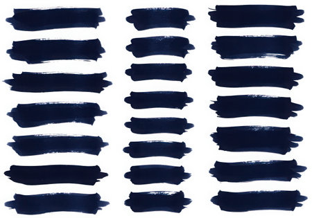 A set of dark blue brush strokes arranged in rows. Each stroke has a unique shape and texture, resembling paint or ink. They are isolated on a white background, creating a clean and modern aesthetic.の素材