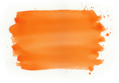 A vibrant orange watercolor brush stroke with splatters, perfect for artistic designs and backgrounds. The texture adds depth and visual interest to any creative project.の素材