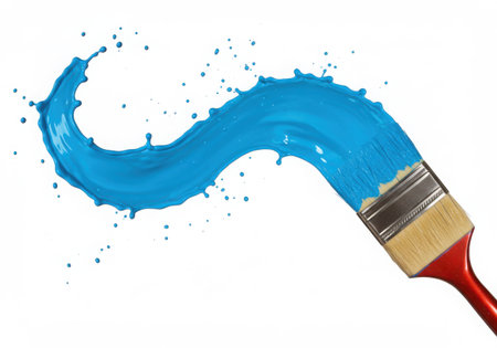 A vibrant image showcasing a paintbrush with a dynamic blue paint splash. The paint creates a fluid, artistic stroke, suggesting creativity and design. Isolated on white, the image emphasizes the paint's texture and color.の素材