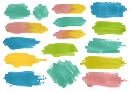 A set of watercolor brush strokes in various colors like blue, green, yellow, and pink. These strokes are isolated on a white background and can be used for artistic and decorative purposes.の素材