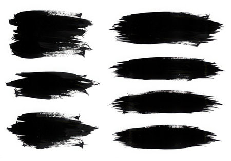 A set of six black paint brush strokes with rough textures and edges, creating an artistic and grunge effect. Isolated on a white background, these strokes offer a versatile design element.の素材