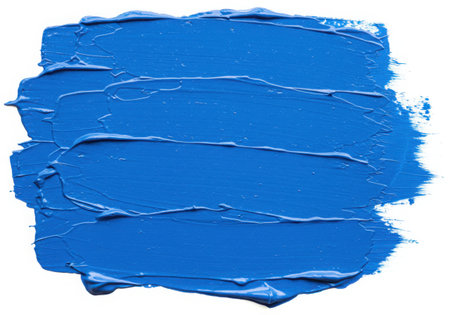 A textured smear of vibrant blue paint, applied with a brush, creates an abstract pattern. The acrylic paint stroke stands out against a clean white background, showcasing its rich color and artistic design.の素材