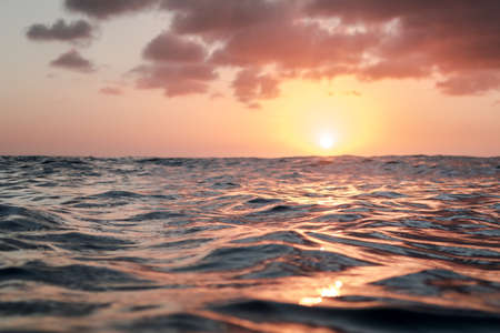 The light of the sun reflect like on liquid metalの写真素材