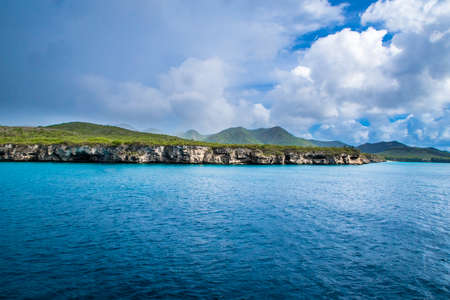 Stormy weather incomin while the island is still striked by sun give beautiful contrastの写真素材