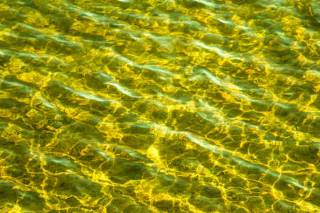 Modified color water surface of a calm riverの写真素材