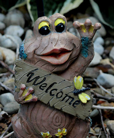 Welcome statue in garden entranceの写真素材