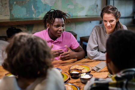 Close up of highschool students having a lunch in a modern cafeの写真素材